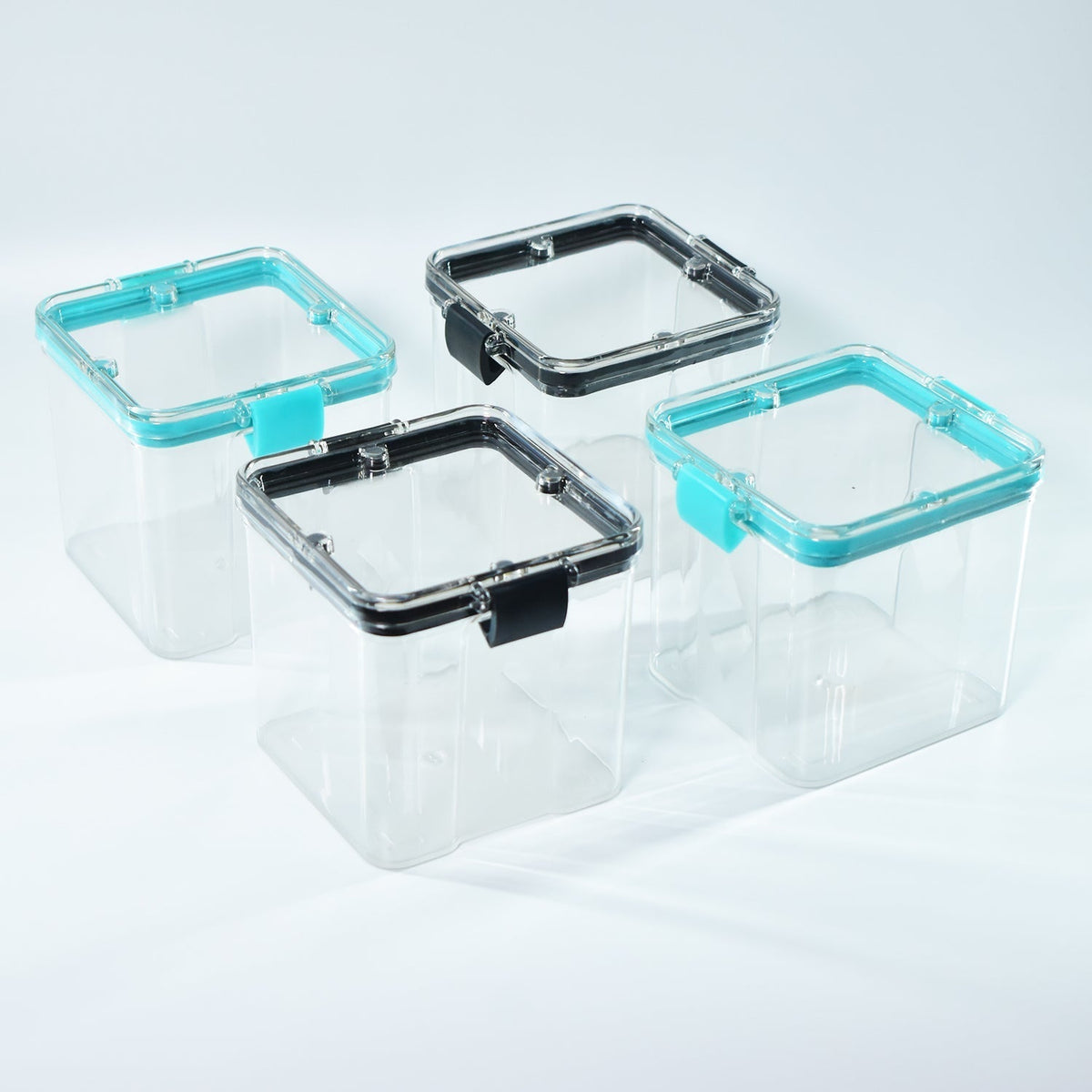 A set of four 700ml plastic food storage containers, perfect for storing dry goods.