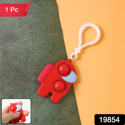 Close-up of a Pop-It Fidget Keychain showing two pushable bubbles and its soft silicone texture.