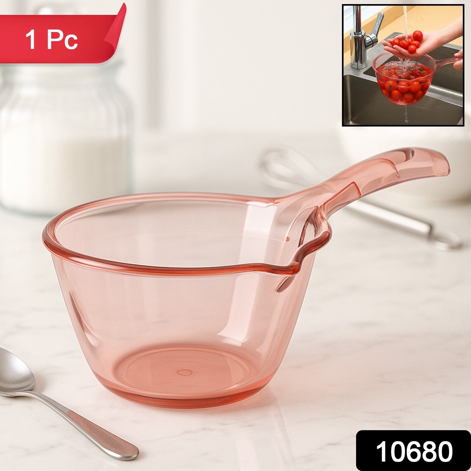 Close-up of the built-in strainer slot on kitchen washing bowl