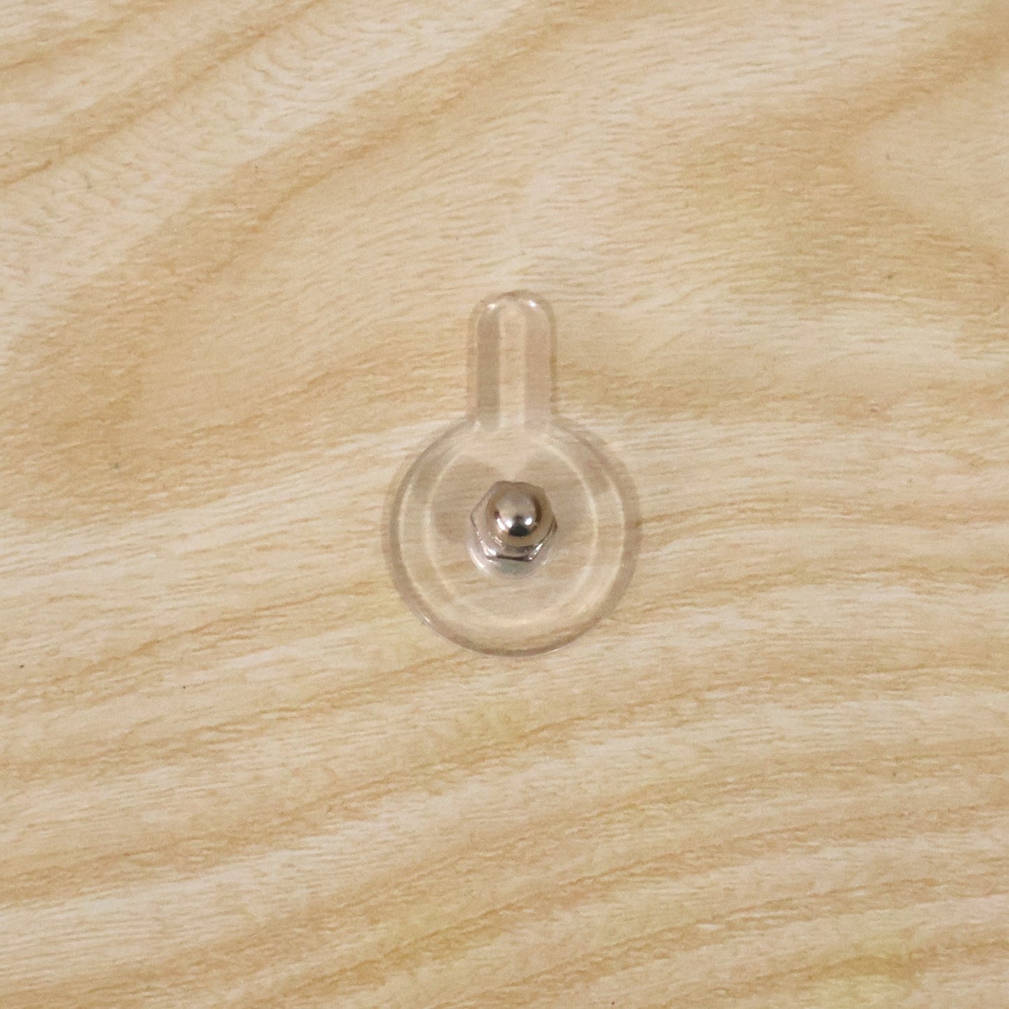 Everyday use of adhesive wall hook for home organization