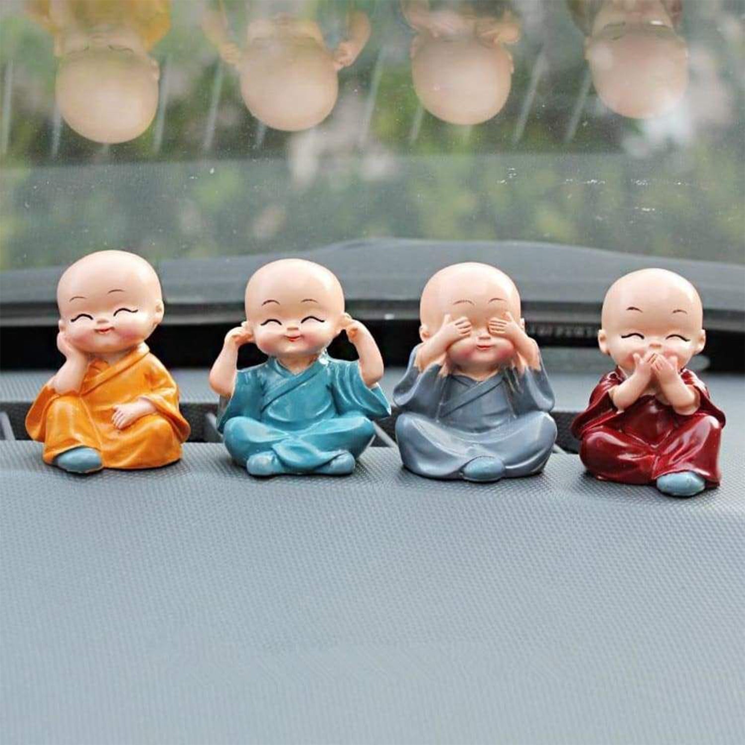 Baby Buddha 4-piece statue set displayed for home decoration