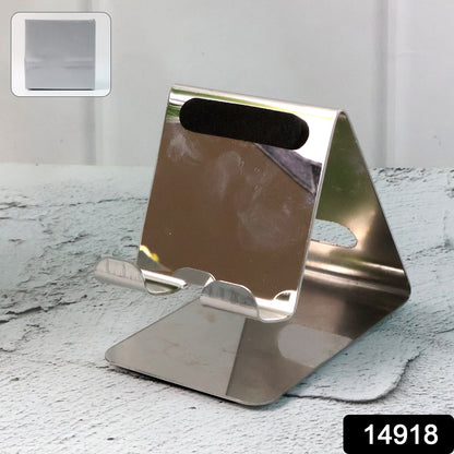 Mobile and tablet supported on universal stand holder for hands-free use