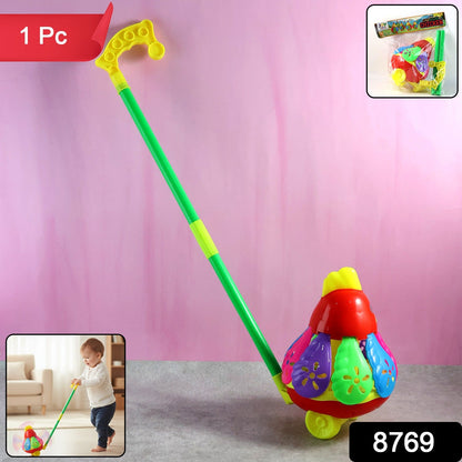 Toddler playing with colorful chicken push toy boosting motor skills