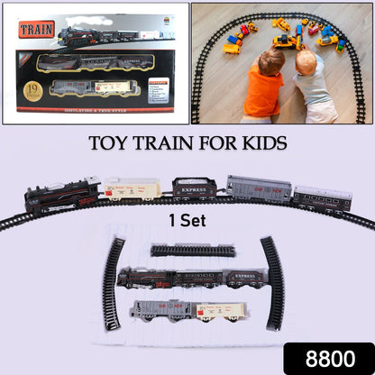 Children playing with battery operated express toy train set