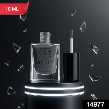 Hand applying Calm Grey Matte Nail Polish for an elegant, modern look.