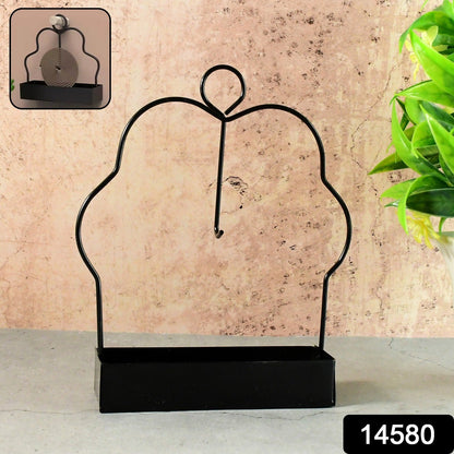 Side view of a mosquito coil holder with vertical hook and ash collection tray