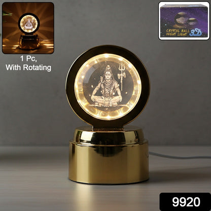 Close-up of crystal ball with 3D Lord Mahadev engraving