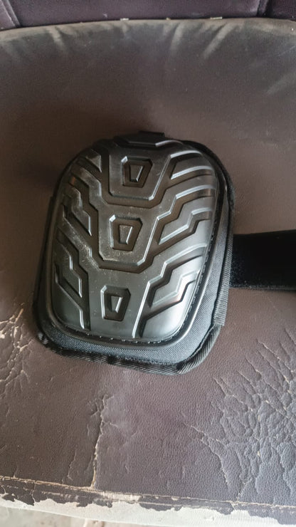 Heavy-duty knee pad displayed upright showcasing its protective shell and padding