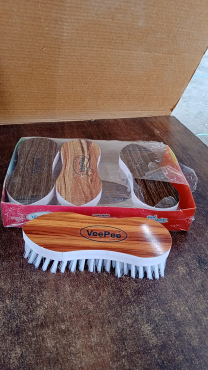 Close-up of durable plastic laundry brush with medium-hard nylon bristles