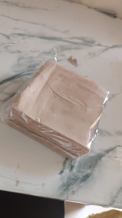 Scalloped edge tissue napkins styled for elegant table setting