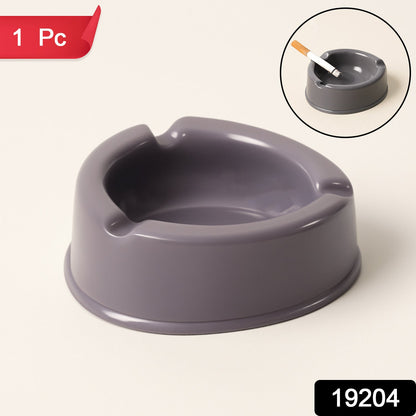 Heavy-duty grey plastic ashtray holding cigarettes securely