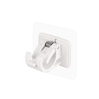 Wall-mounted adhesive towel holder showing towel rod and hooks