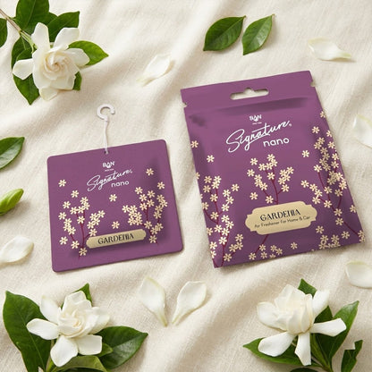 Gardenia air freshener sachet with floral design hanging indoors.