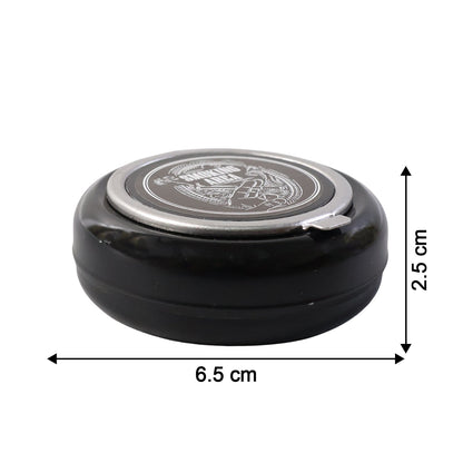 Tabletop ashtray showing deep container for ash collection