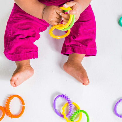 Early learning links toy set with smooth plastic textured rings