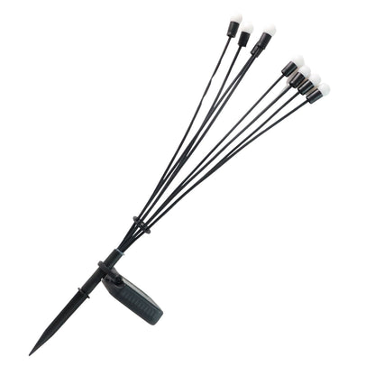 Solar LED fiber optic strands glowing brightly in outdoor setting