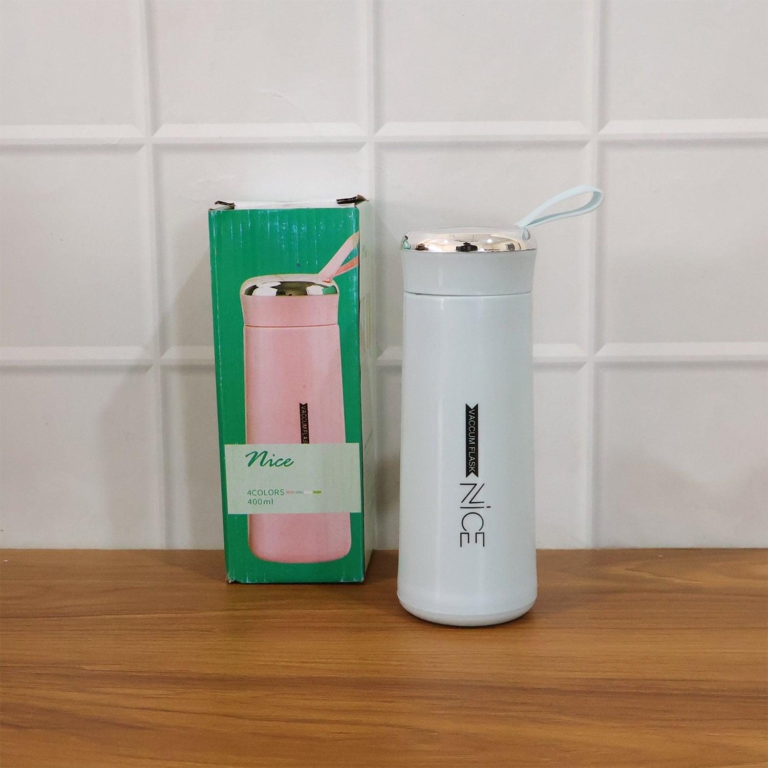 Eco-friendly glass water bottle with leak proof lid suited for travel