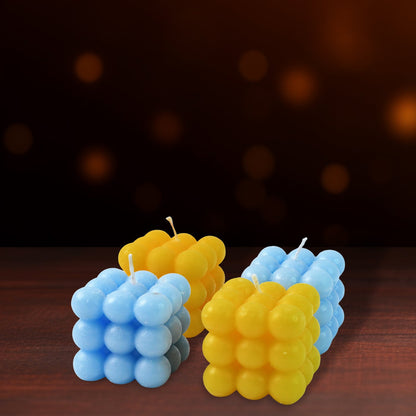 Blue and yellow cube candles with unique bubble design for home decoration