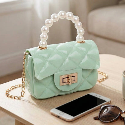 Close-up image highlighting the quilted pattern on a stylish mini handbag