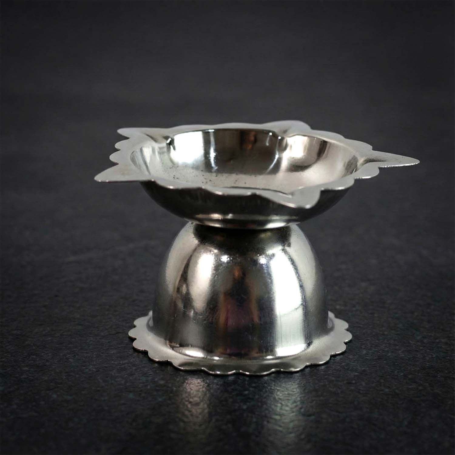 Durable stainless steel diya holder with traditional sunflower design