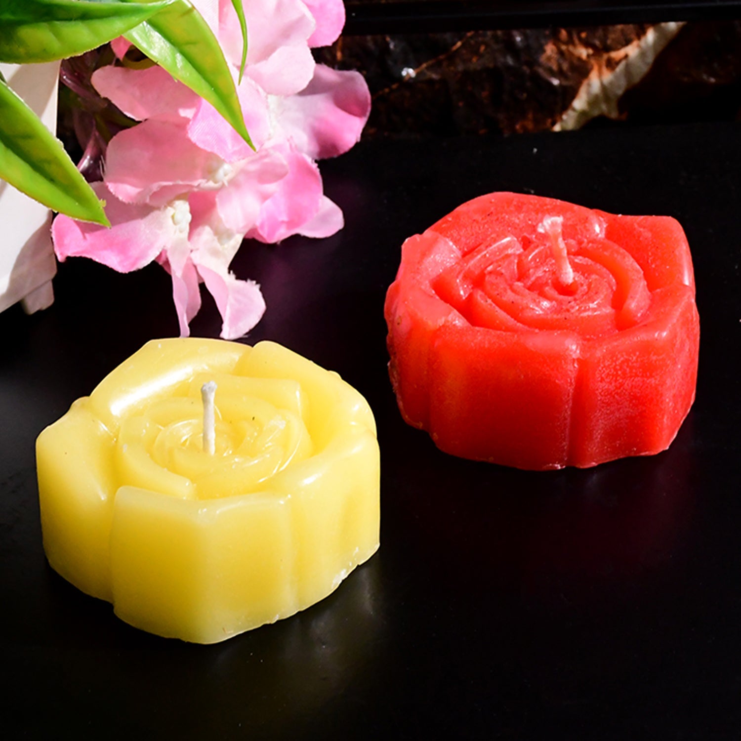 Premium wax rose candles set arranged on a table as elegant party décor