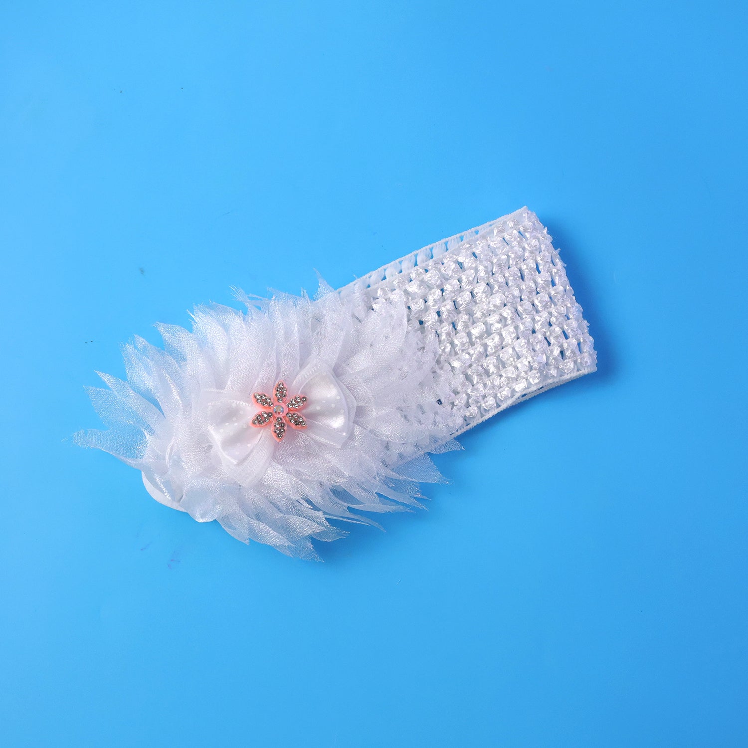 Hair accessory floral baby headband, styled with a cute floral bow