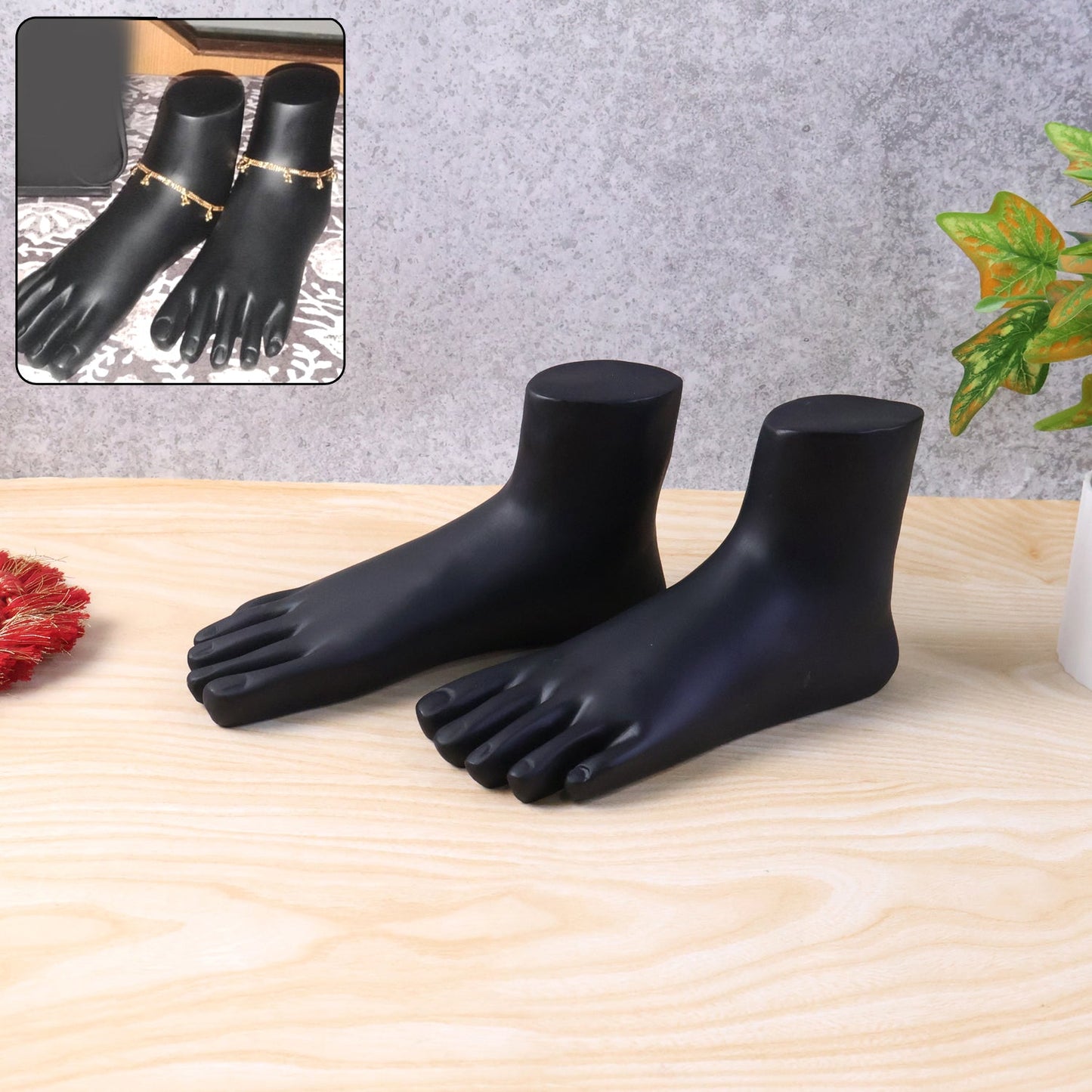 Close-up of premium black foot mannequin display stand highlighting anklets and payal
