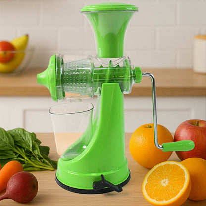 Manual fruit and vegetable juicer showing vacuum lock base