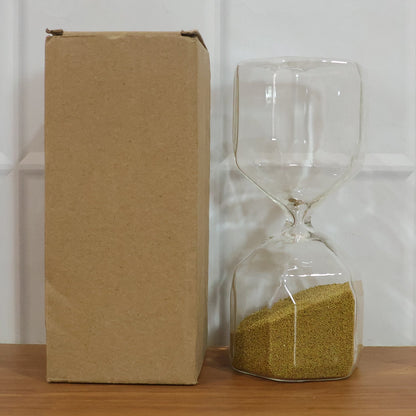 Glass sand timer hourglass on white background