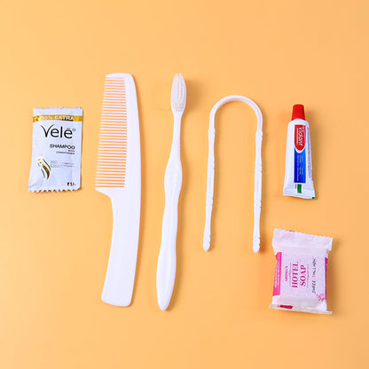 Hotel guest toiletry kit with toothbrush, soap and shampoo sachet