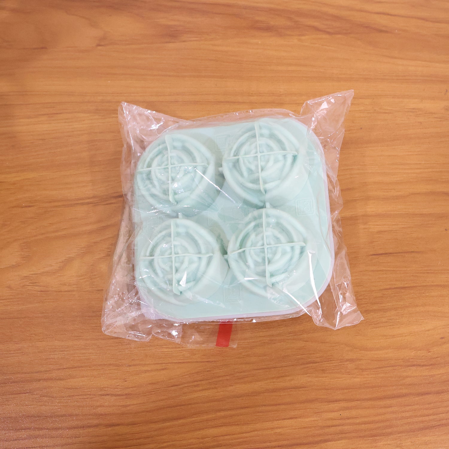 Rose shape ice cube tray used to make decorative ice cubes in drinks