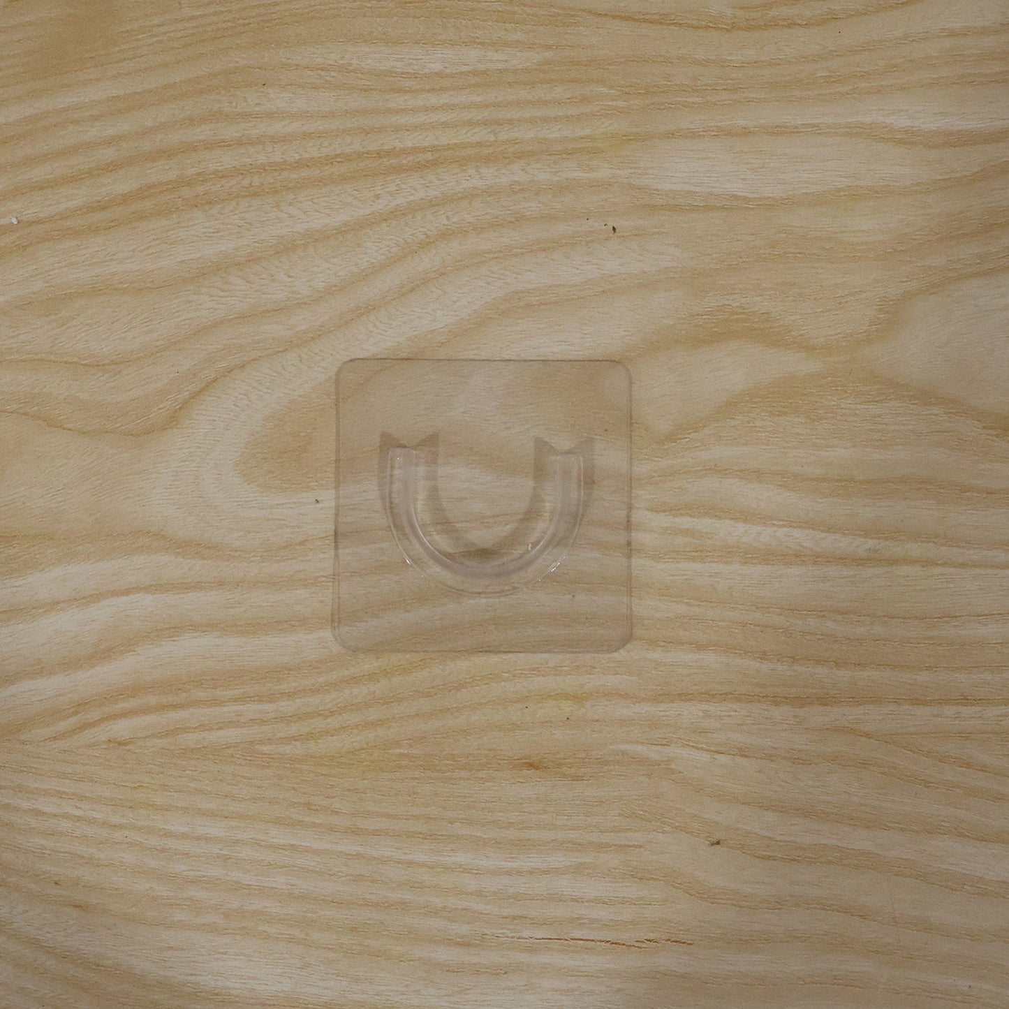 Durable adhesive wall hook for versatile home organization
