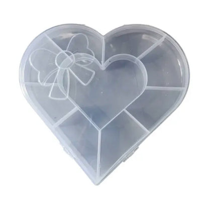 Top view of heart-shaped craft bead storage box with transparent lid in India