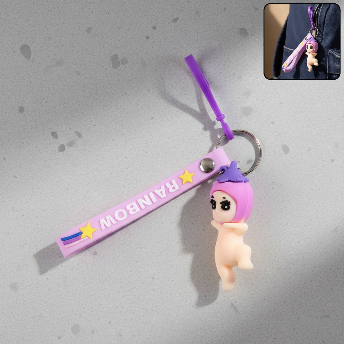 Baby doll silicone keychain with wrist loop strap attached to keys