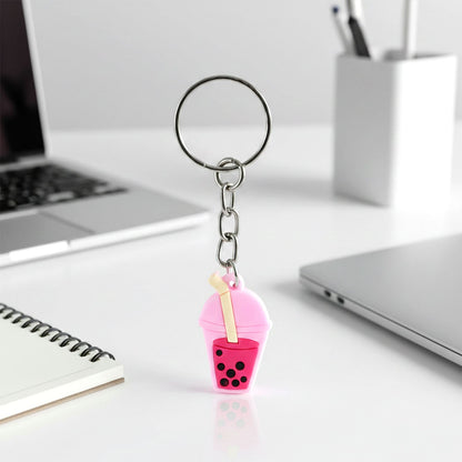 Bubble tea keychain displayed on a backpack zipper pull