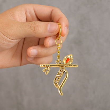 Side angle of Krishna metal keychain showing elegant metal finish