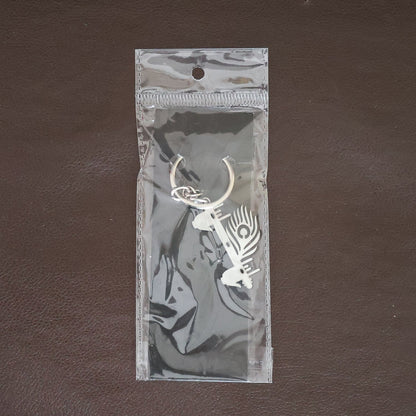 Krishna Flute Keychain displayed in a lifestyle setting, perfect for daily use.