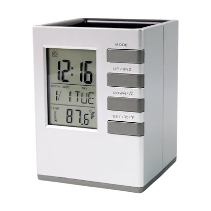 LCD display of digital desk clock showing time, date, and temperature clearly