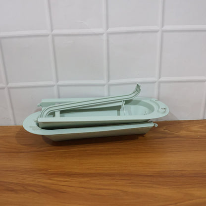 Telescopic sink storage rack installed in modern kitchen setting