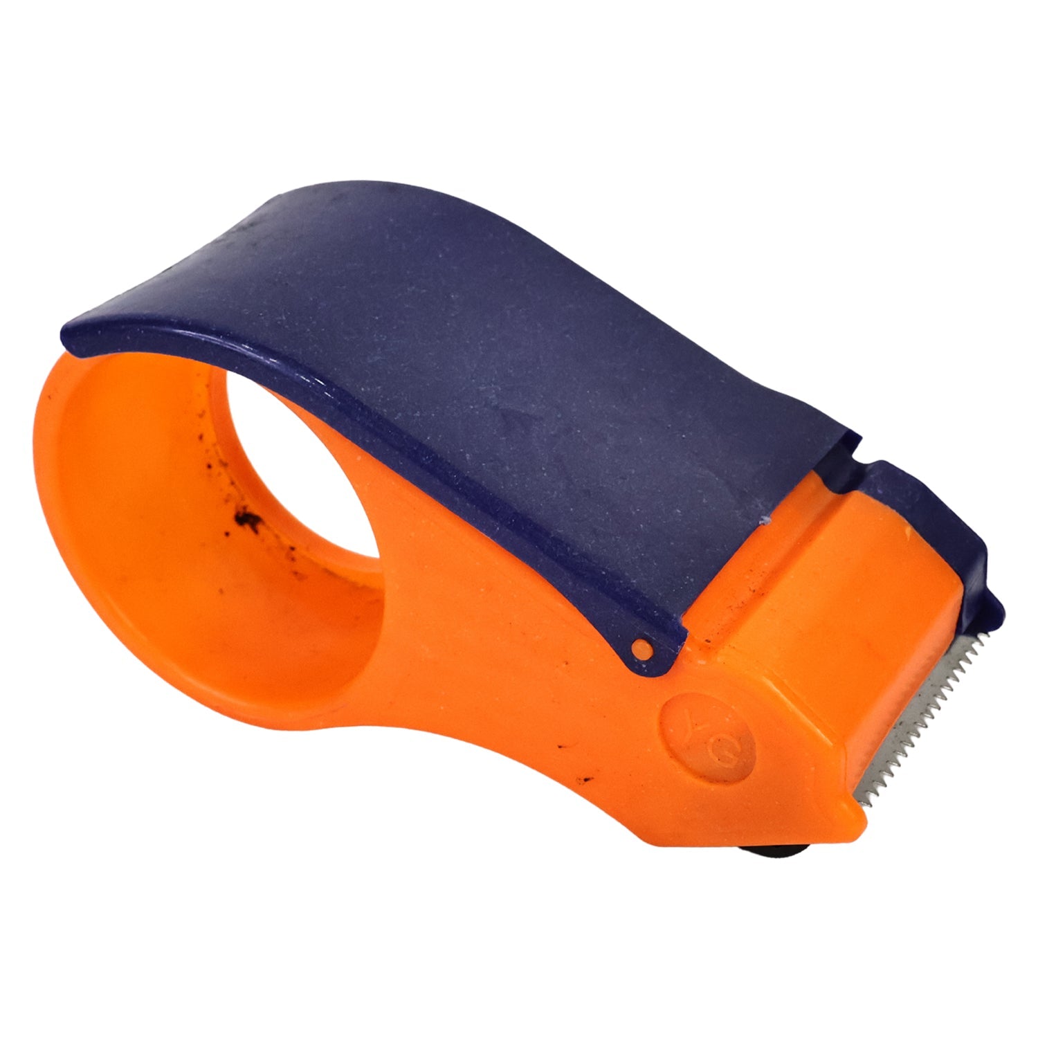 Close-up of the sharp serrated cutter on the tape dispenser for clean cuts.