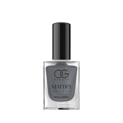 Woman showcasing her hands with quick-dry Calm Grey Matte Nail Polish.