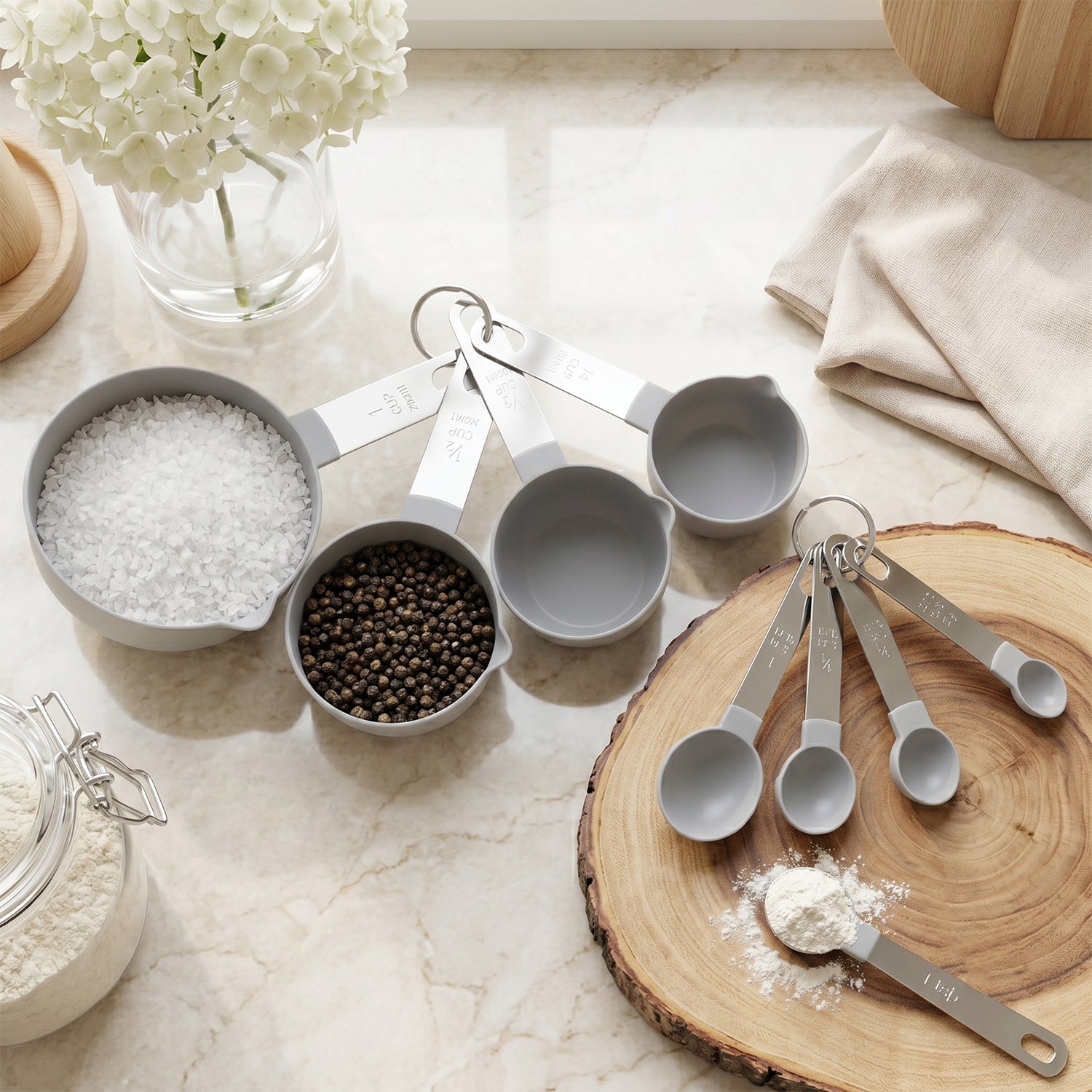 White measuring cups on a kitchen countertop