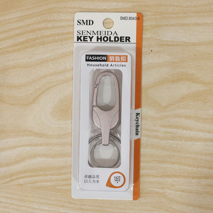 Metal keychain displayed with size reference