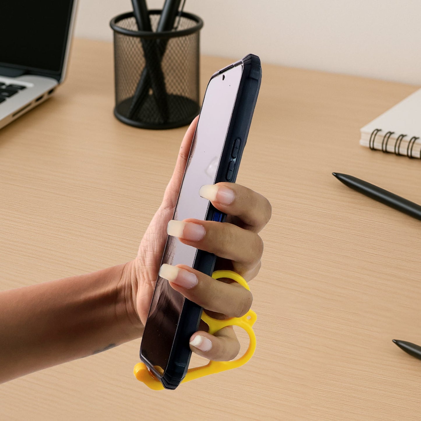 Compact plastic hand-shaped mobile phone stand in vibrant mix colors