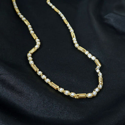 Patterned stone design on gold tone chain necklace