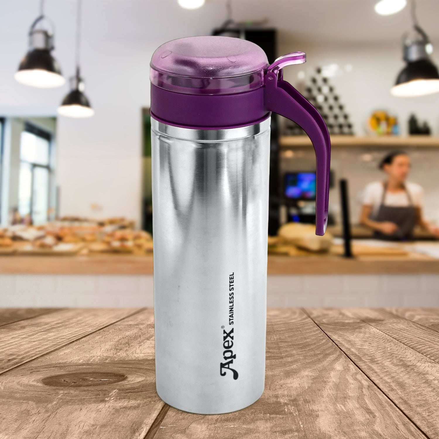 Close-up of oil bottle featuring anti-drip spout for spill control