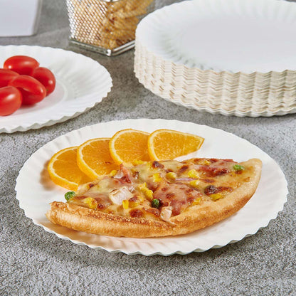 Freshee 7 inch compostable paper plate holding assorted snacks showing sturdy design.