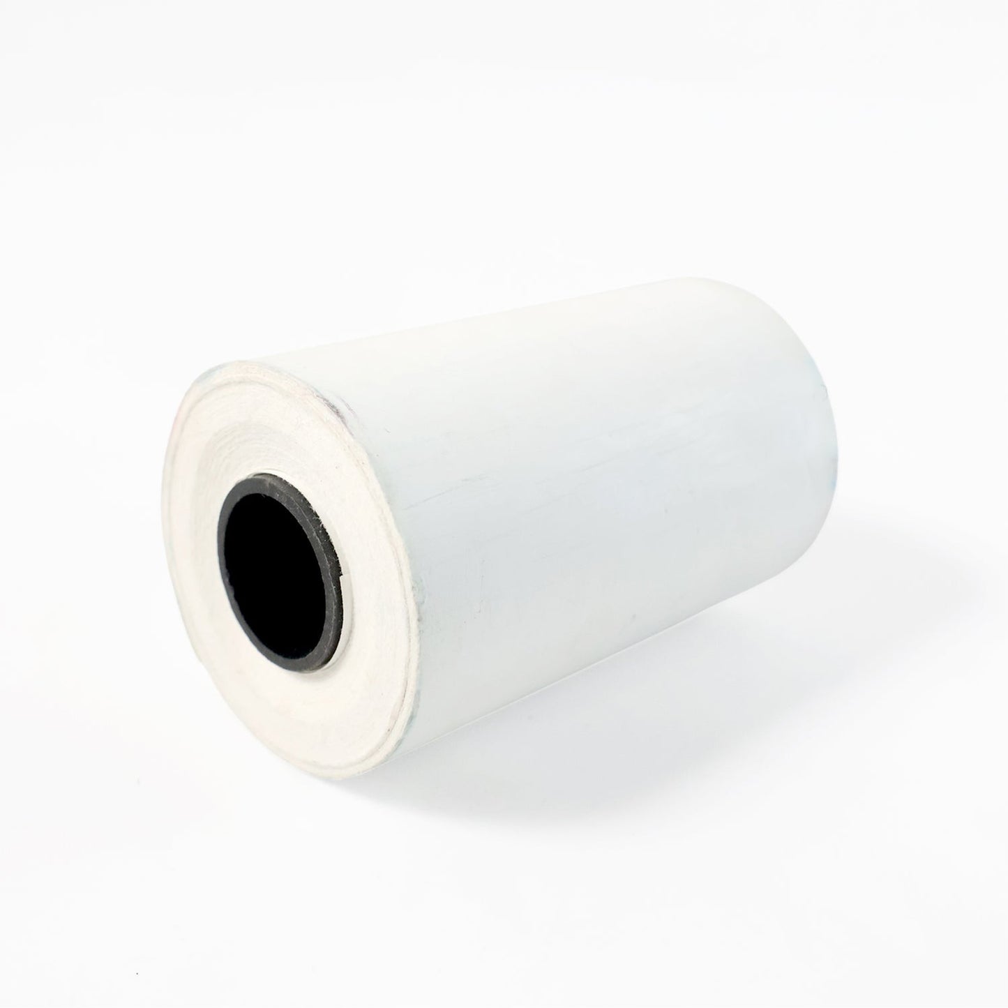 Close-up view of thermal label roll showing label texture