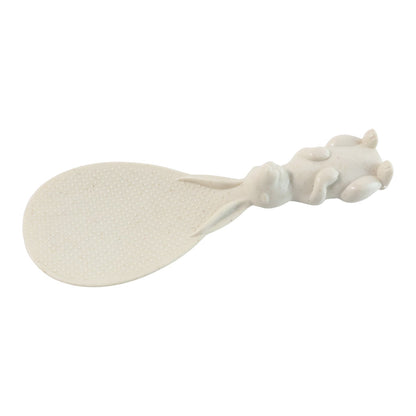 Detailed close-up showing textured non-stick spoon surface