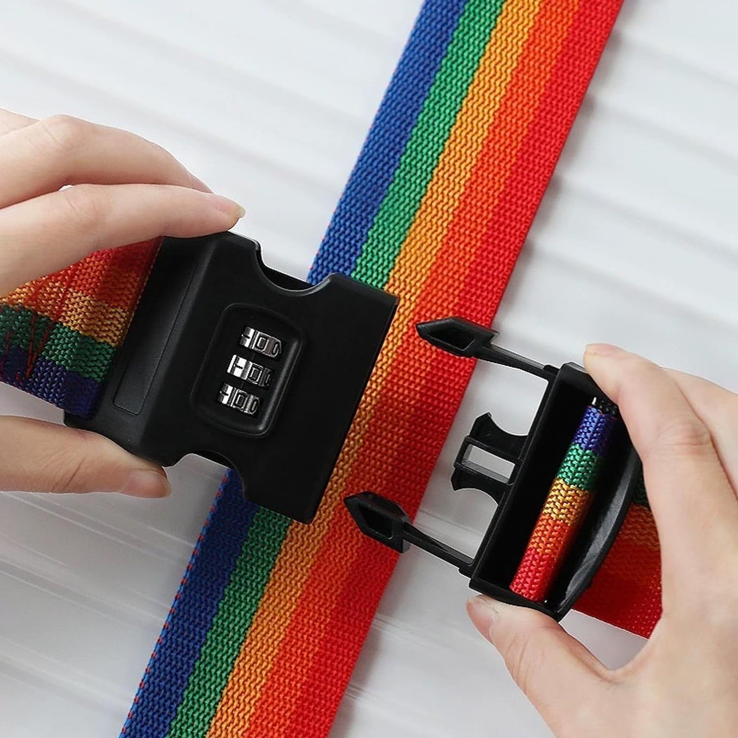 Rainbow Luggage Strap neatly folded for compact storage when not in use.